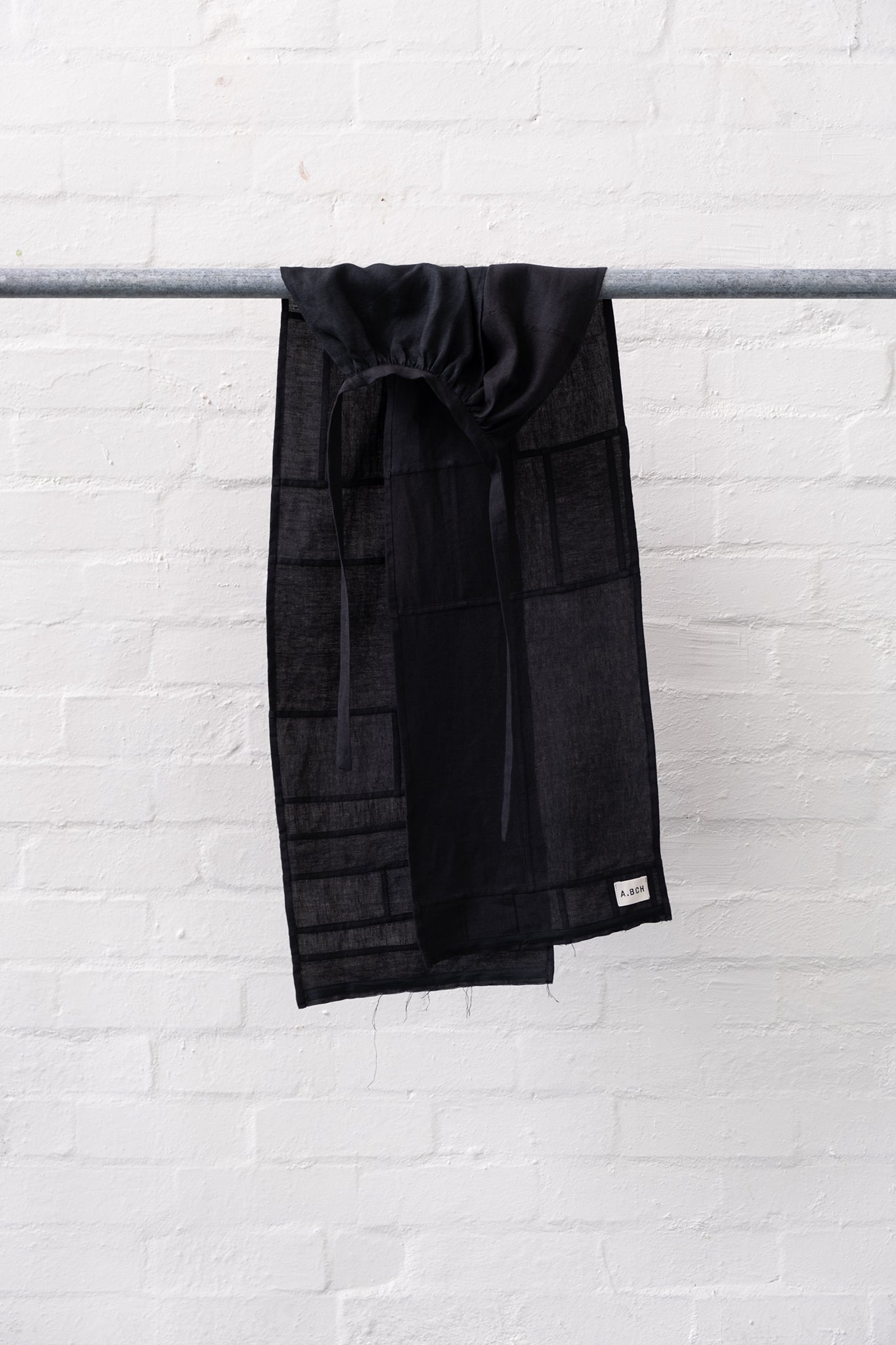Red Line - The Styling Piece Black in organic linen offcuts