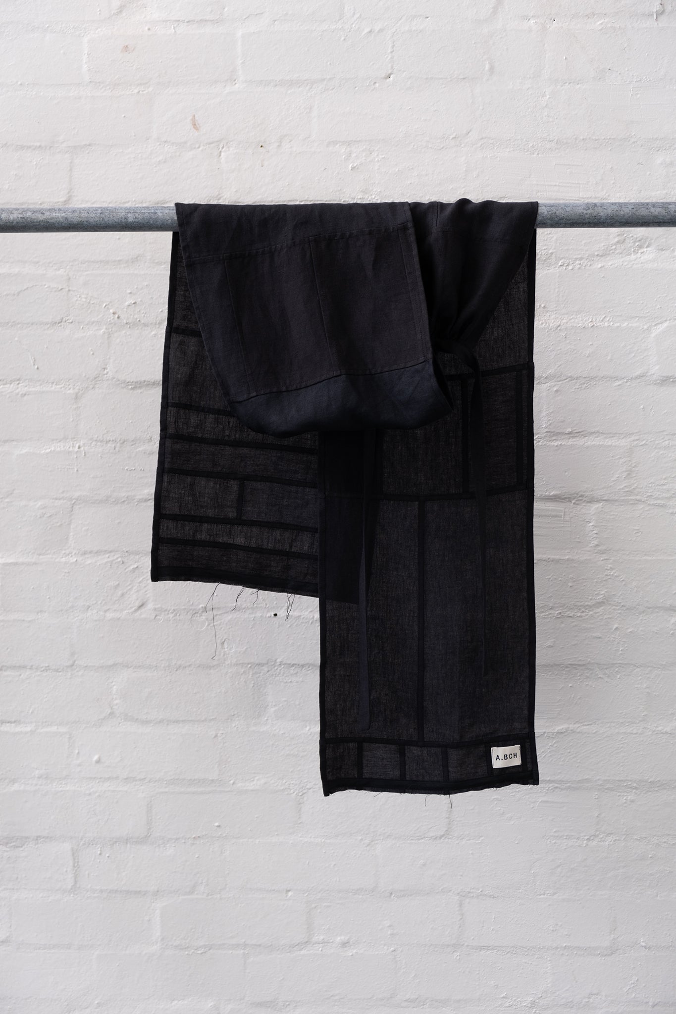 Red Line - The Styling Piece Black in organic linen offcuts